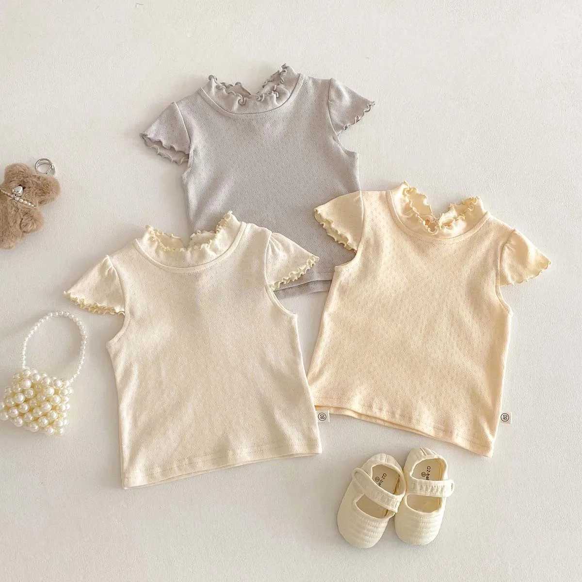 Childrens Summer Korean Short Sleeve Flying Sleeve Bottom Top Infants Girls Solid Color Threaded Ear Collar Versatile T-shirtT250320