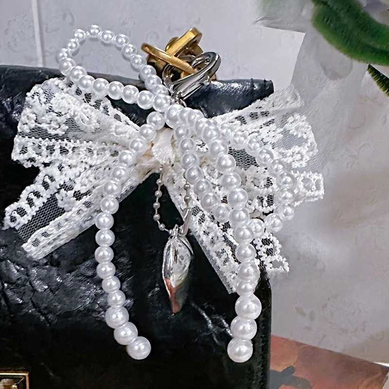 1 piece of sweet lace bow bead bow keychain mobile phone charm with pendant mobile phone accessory bag girls hanging ropeXJ250319