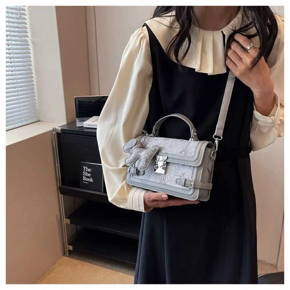 Elegant embossed shoulder bag with metal buckle square bottom bag and exquisite cross shaped body bag Y250319