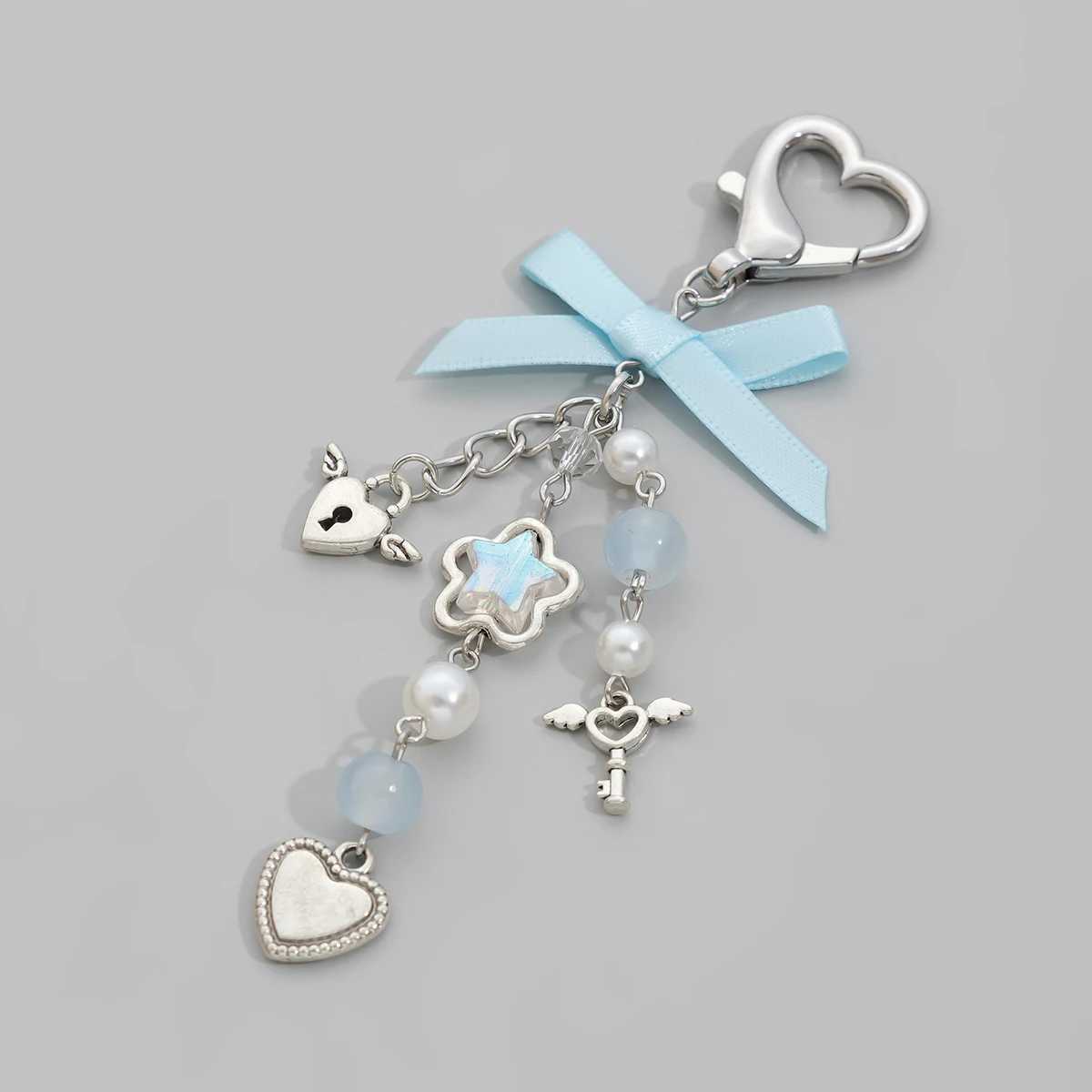 IngeSight. Z Sweet and Cute Blue Bow Star Charm Keychain Womens Fashion Imitation Pearl Love Pendant Keychain JewelryXJ250319
