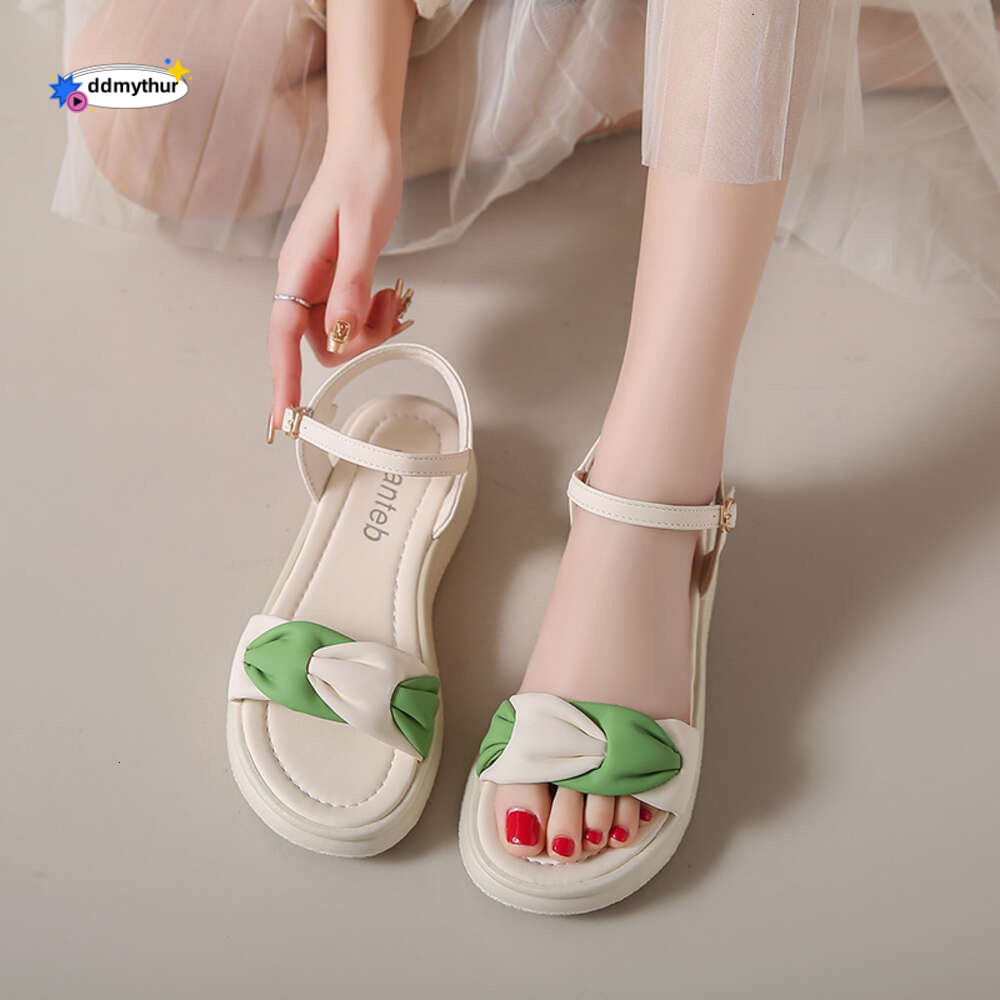2024 new women's one-line buckle muffin bottom side empty summer cool breathable soft soled white sandals ddmythur