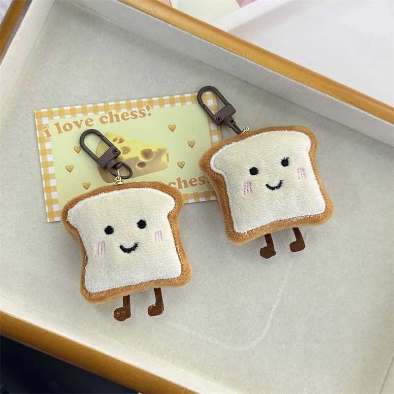 1 Japanese popular cute keychain cute yellow noodle bun toast plush pendant keychain creative expression exquisite presentationXJ250319