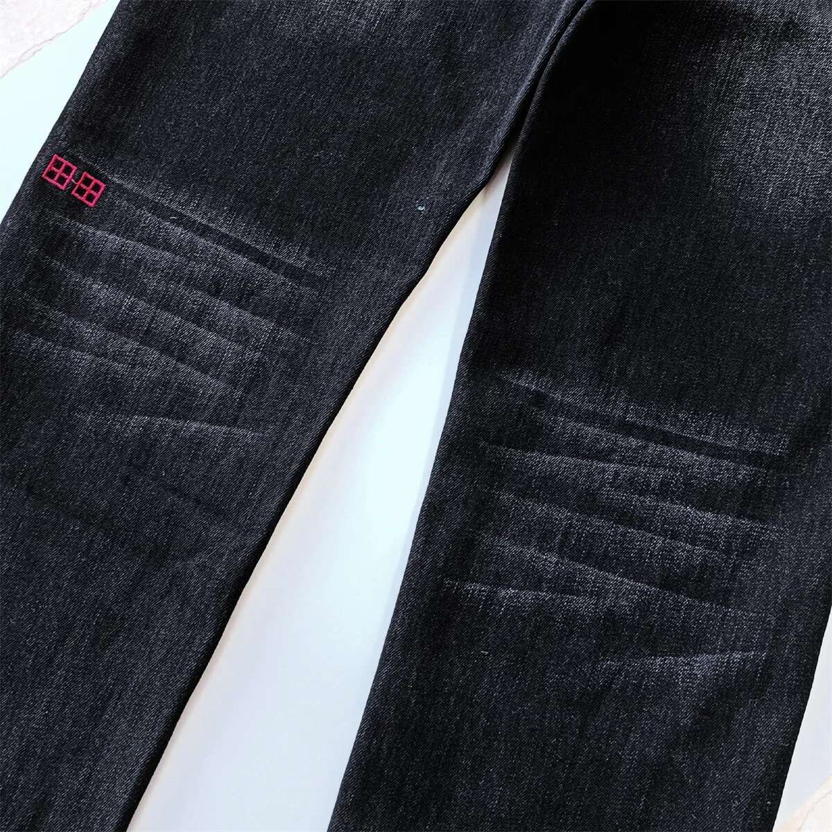 Designer Jeans 2025 Spring/summer New Men's High Street Retro Washed Black Letter Printed Trendy Daily Casual Low Waist Elastic Tight Jeans Brand