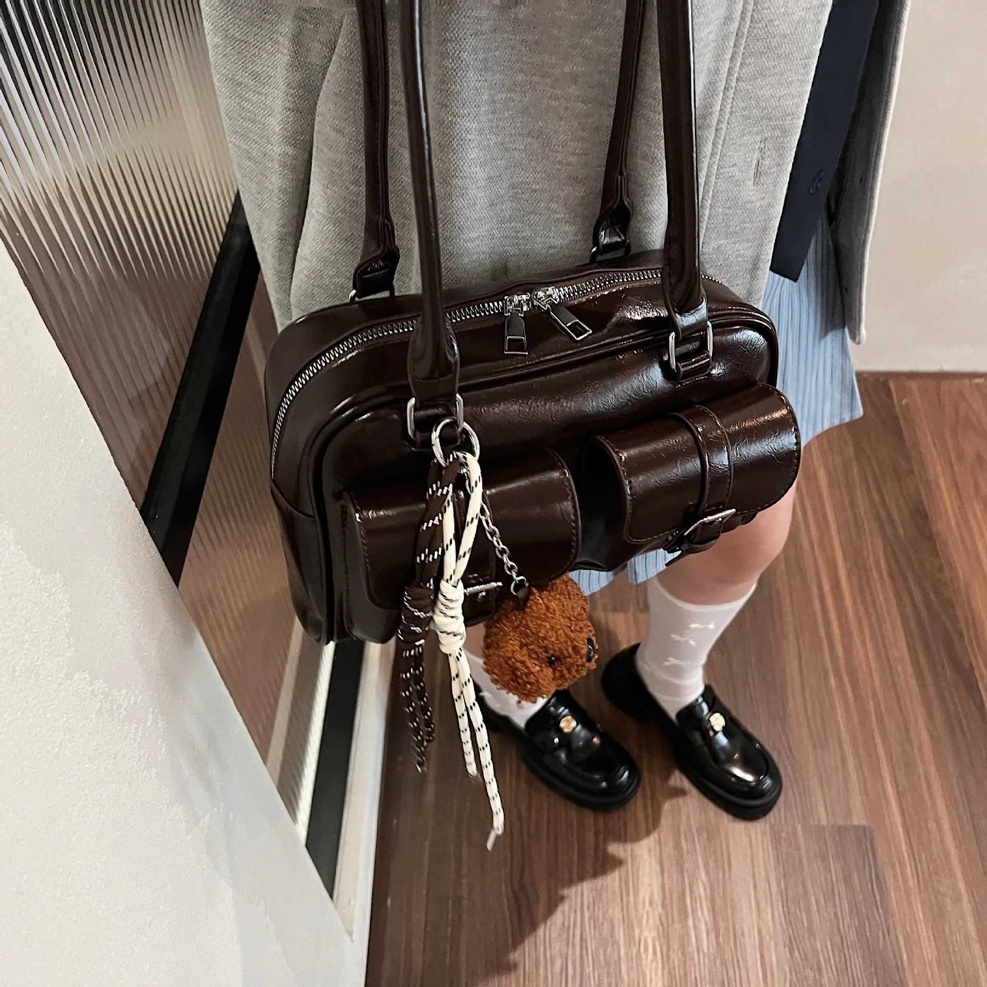 25 year new womens bag pillow bag womens lightweight luxury niche Pu high-end feeling handheld bill of lading shoulder bag S Y250320
