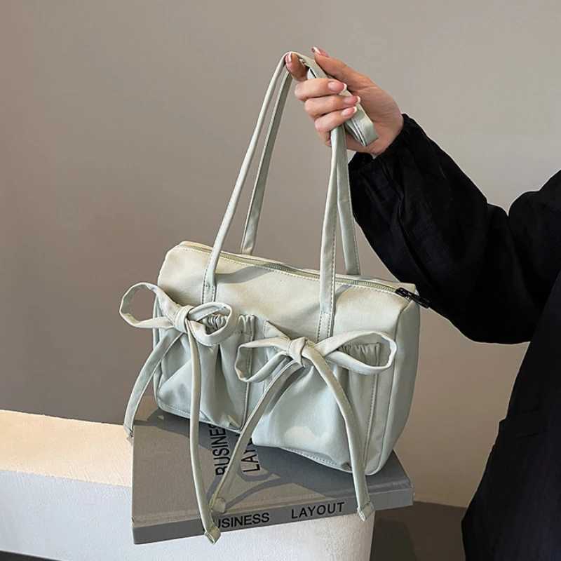 2025 New Korean Bow Nylon Shoulder Bag Fashionable and Sweet Design Folding Large Capacity Commuter Womens Handbag Y250320