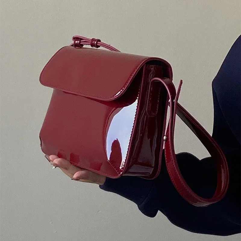 Retro patent leather shoulder bag womens luxury designer cross shaped bag small square bag fashionable womens underwear handbag Y250320