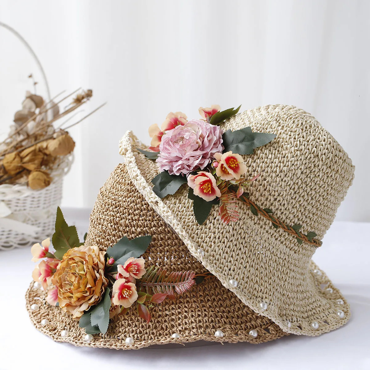 Sun hat floral fashion style bucket hat multi-color folding Sun Crochet hat suitable for beach tourism and vacation handmade straw hats 250320