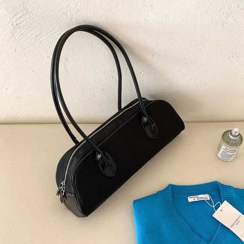 Korean handheld French bag for autumn and winter high-end feeling niche style shoulder bag for women nylon for women Y250319
