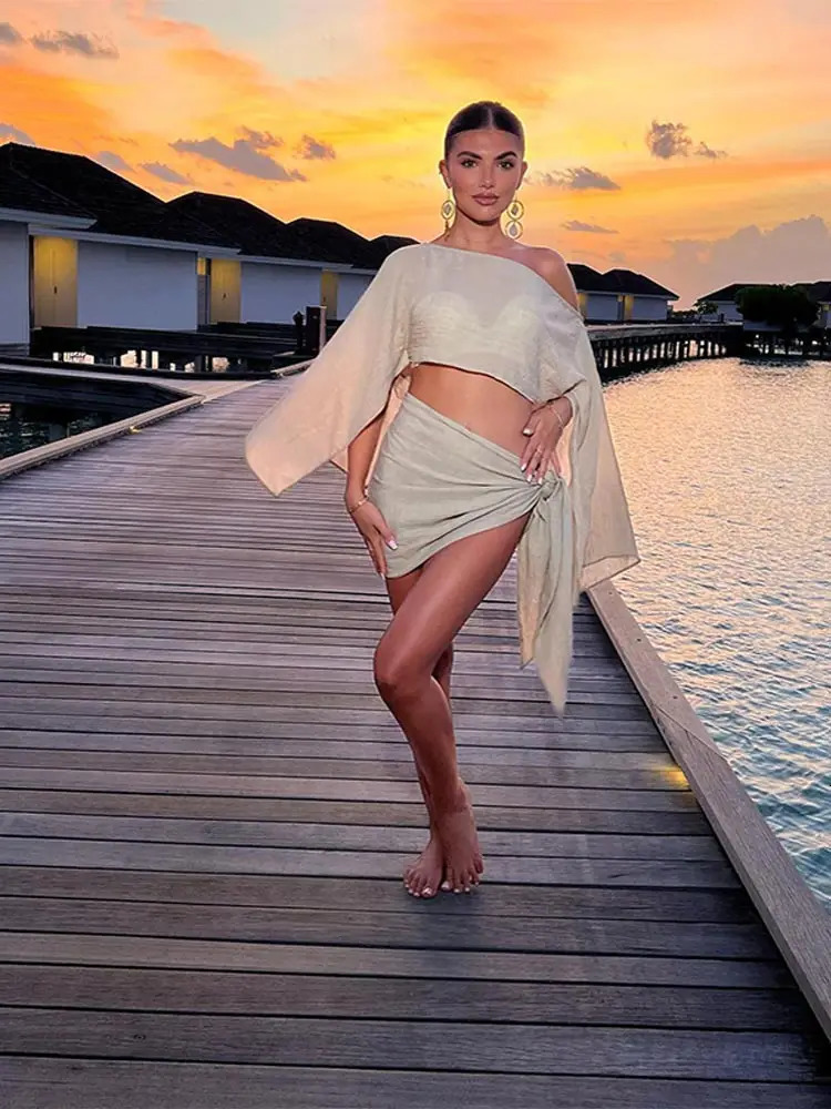 Sexy Solid Pleated Knot Mini Skirts Sets For Women Chic One Shoulder Flared Sleeve Loose Cape Tops Suits 2025 Lady Party Outfits 250320