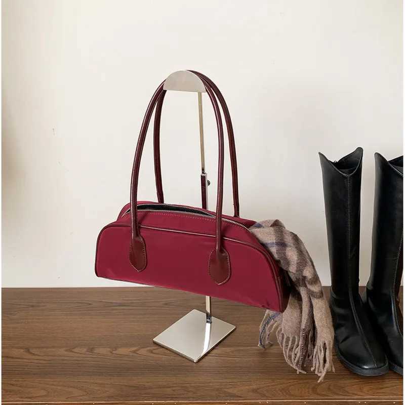 Korean handheld French bag for autumn and winter high-end feeling niche style shoulder bag for women nylon for women Y250319