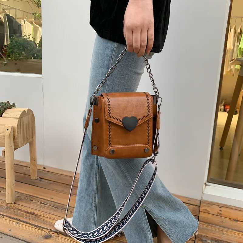 Womens handbag PU leather high-quality messenger cross body bag retro heart-shaped lock womens shoulder bag Y250320