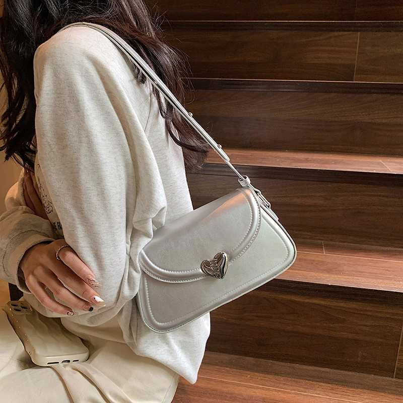 MOODS Loving heart-shaped buckle cross body bag for women 2023 luxury designer handbag silver small shoulder phone bag Y250319