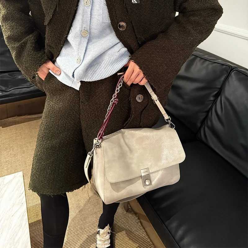 Newly designed womens cross shaped bag fashionable rope shoulder strap womens shoulder bag Y250320