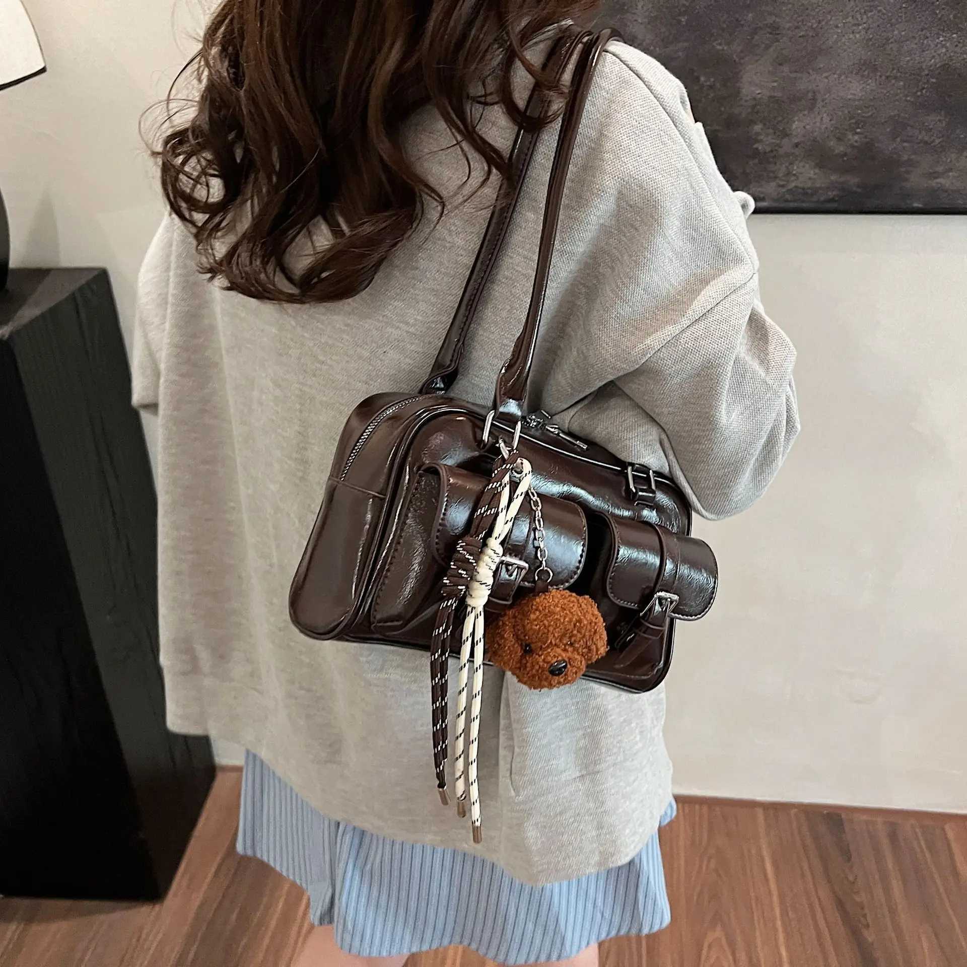 25 year new womens bag pillow bag womens lightweight luxury niche Pu high-end feeling handheld bill of lading shoulder bag S Y250320