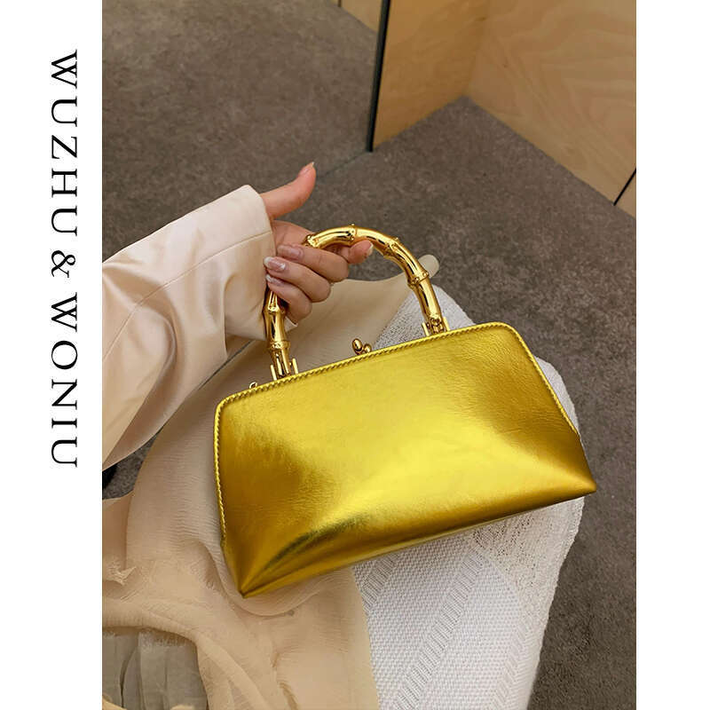 Women's Bags Small niche design with golden bamboo handle lock buckle, hand-held small square bag, new fashionable high-end mouth gold bag for wo