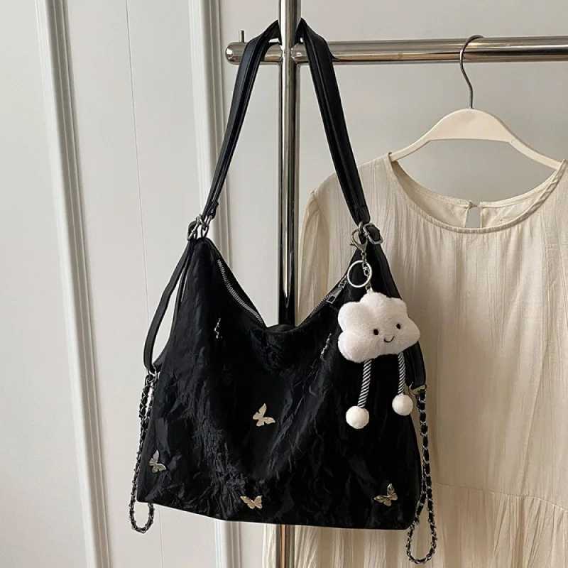 Large capacity bag suitable for women 2024 new summer high sensation niche commuting handbag single shoulder cross body bag Y250320