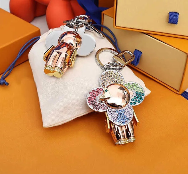 Designer Bag charm Series Sunflower Keys Wallet Luxury Color Rhinestone Letter Doll Keychain Fun Car Pendant Couple Bags Totes Pendant Key Chain Women Men L
