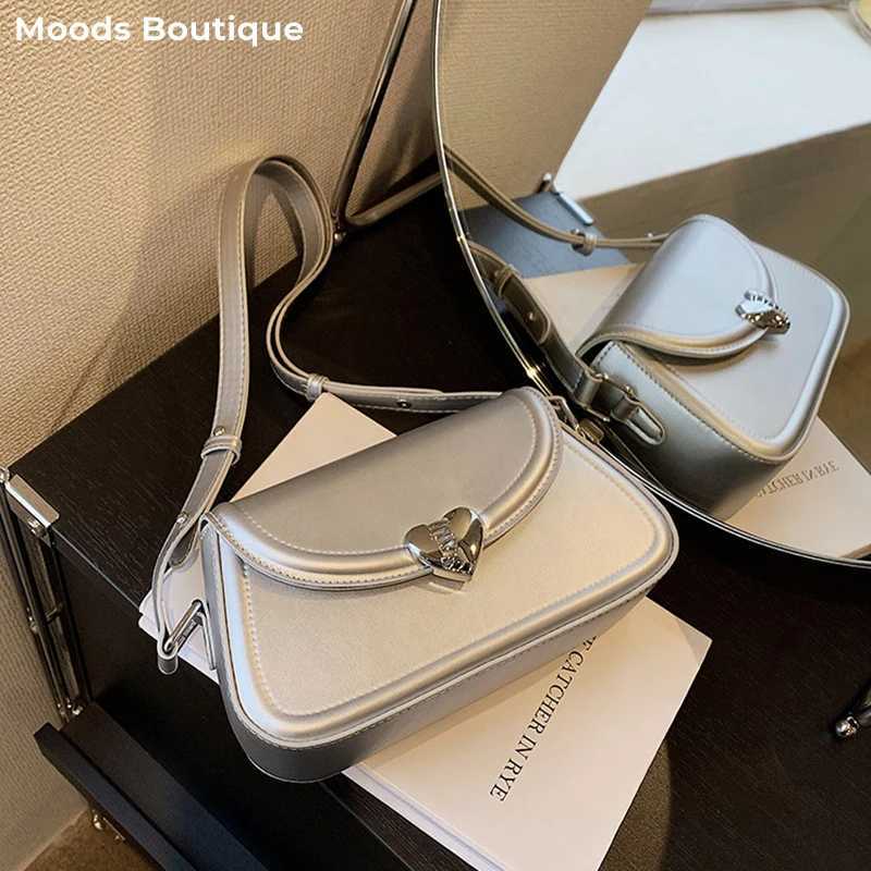 MOODS Loving heart-shaped buckle cross body bag for women 2023 luxury designer handbag silver small shoulder phone bag Y250319