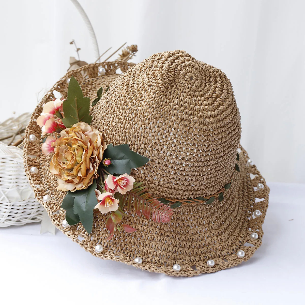 Sun hat floral fashion style bucket hat multi-color folding Sun Crochet hat suitable for beach tourism and vacation handmade straw hats 250320
