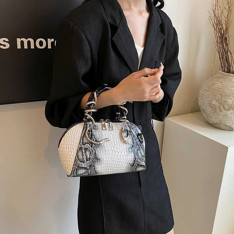 MOODS Designer Womens Luxury Bag Odile Pattern Top Handle Shell Bag with Snake Hardware Wild Shoulder Cross Handbag Y250319