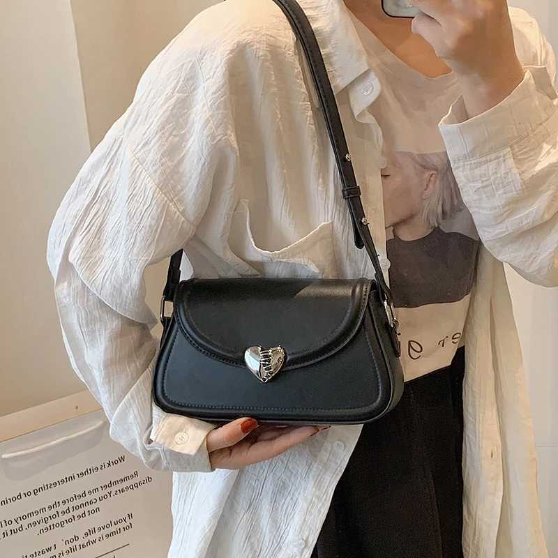 MOODS Loving heart-shaped buckle cross body bag for women 2023 luxury designer handbag silver small shoulder phone bag Y250319