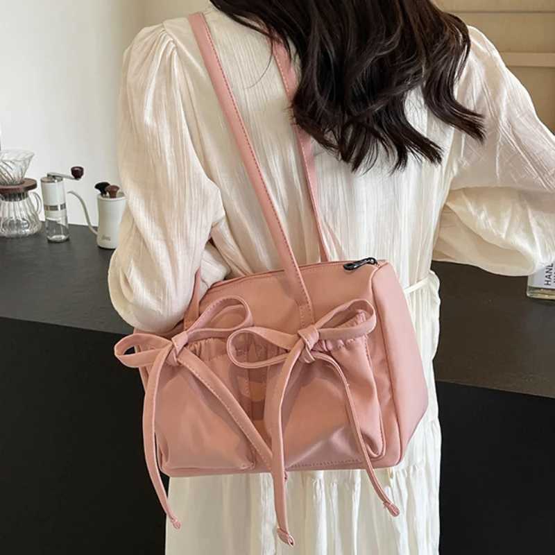 2025 New Korean Bow Nylon Shoulder Bag Fashionable and Sweet Design Folding Large Capacity Commuter Womens Handbag Y250320