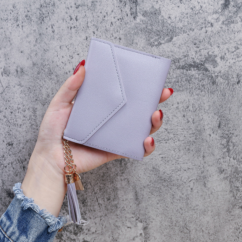 2025S Trend Designer New Women S Tassel Pendant Litchi Pattern Money Clip Card Bag Zero Wallet