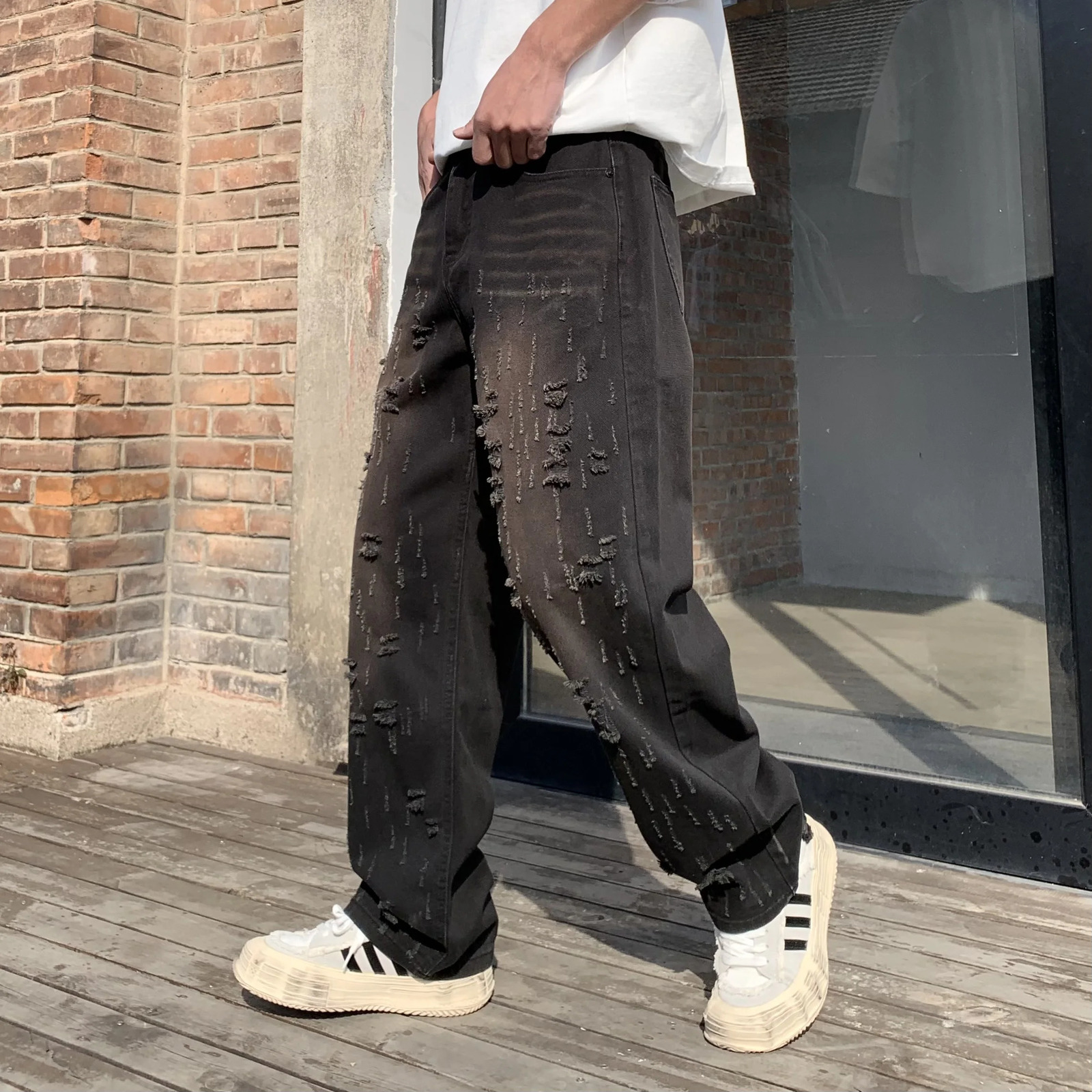 Mens fashion brushed loose straight black washed jeans 250317