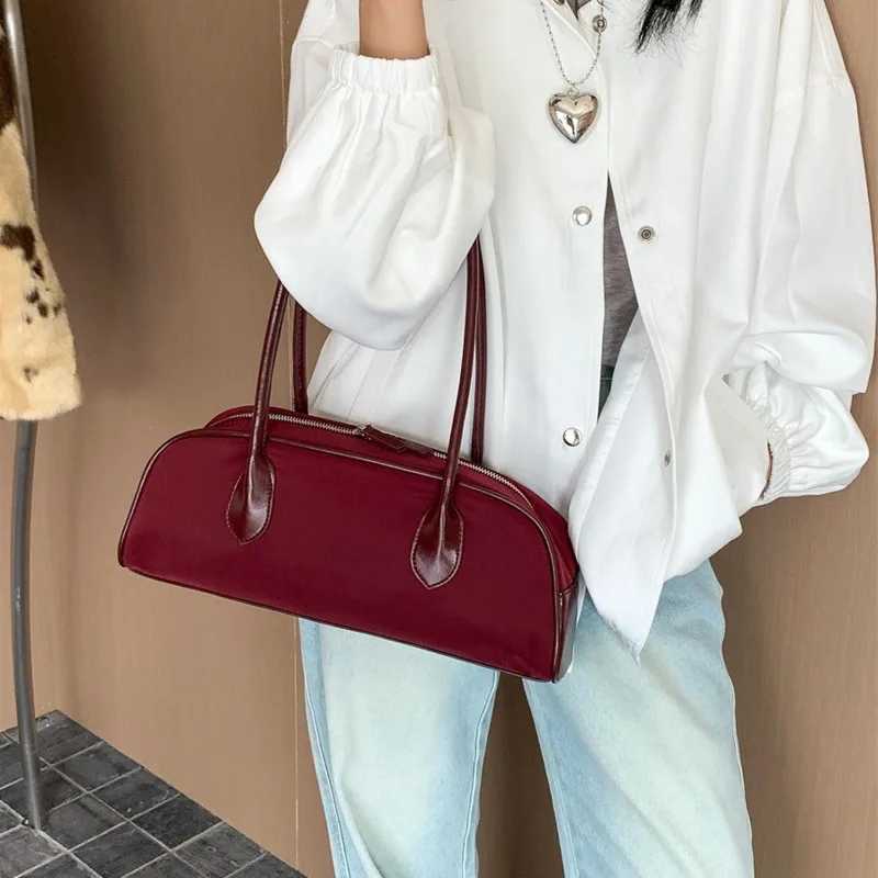 Korean handheld French bag for autumn and winter high-end feeling niche style shoulder bag for women nylon for women Y250319