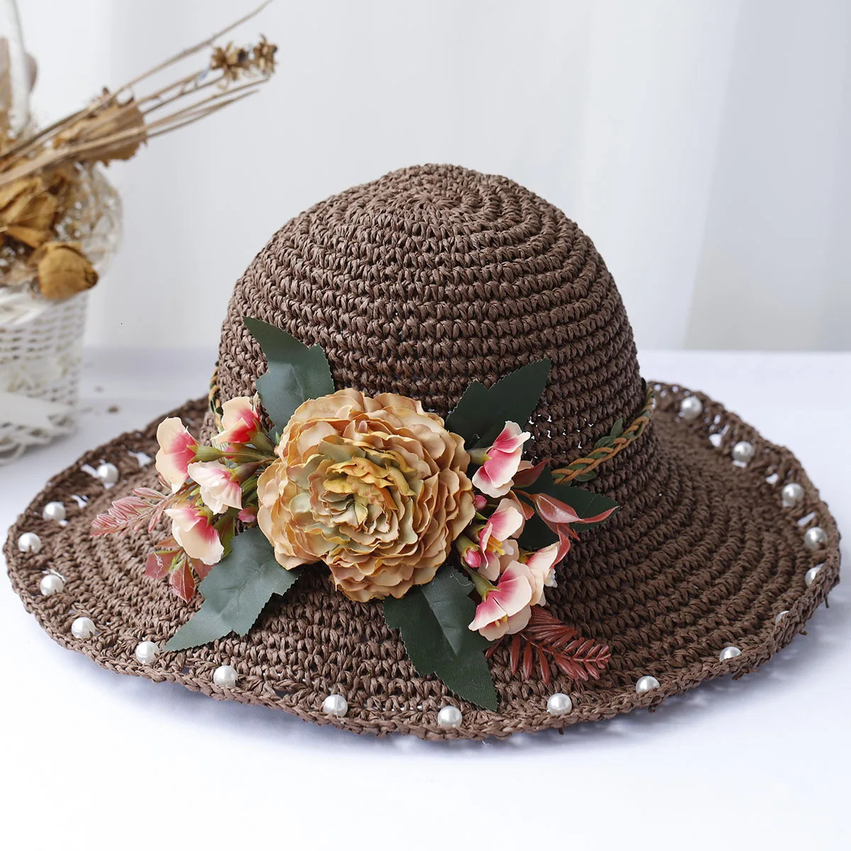 Sun hat floral fashion style bucket hat multi-color folding Sun Crochet hat suitable for beach tourism and vacation handmade straw hats 250320