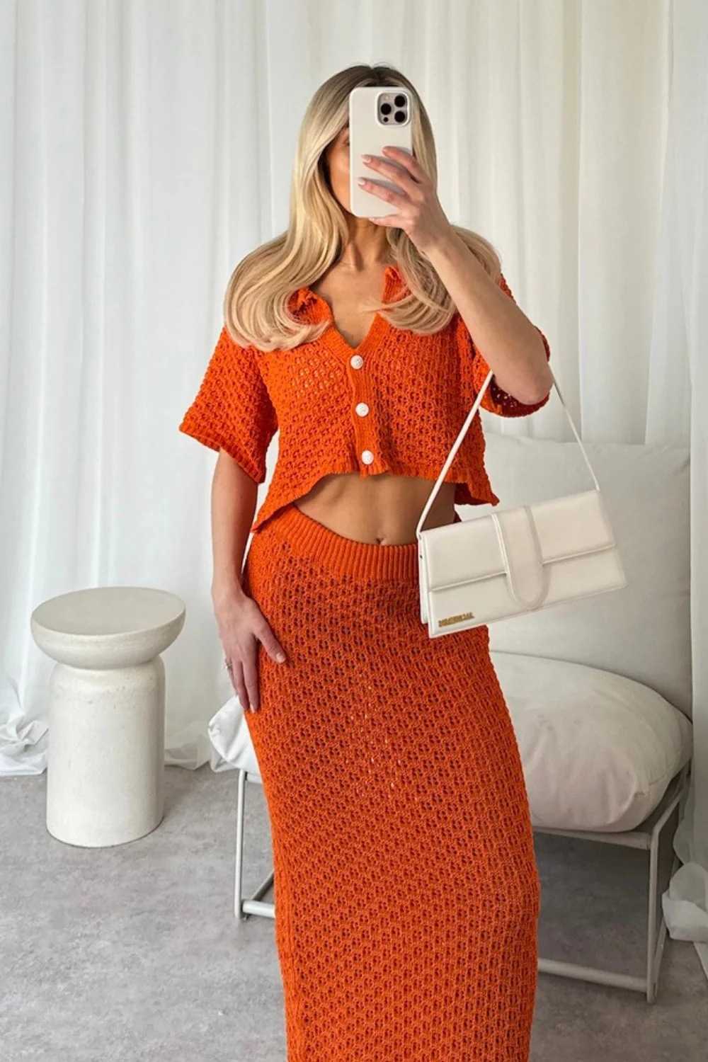 Hollow out short sleeved knitted two-piece cardigan button up skirt versatile top beach sexy suit 250315