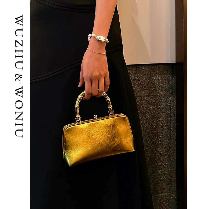Women's Bags Small niche design with golden bamboo handle lock buckle, hand-held small square bag, new fashionable high-end mouth gold bag for wo