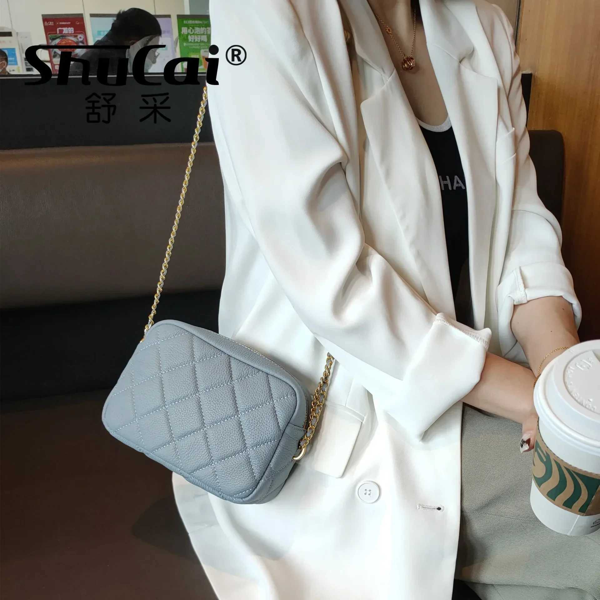 Genuine leather womens diamond shaped fashion chain soft denim shoulder messenger casual designer cross design womens bag Y250319