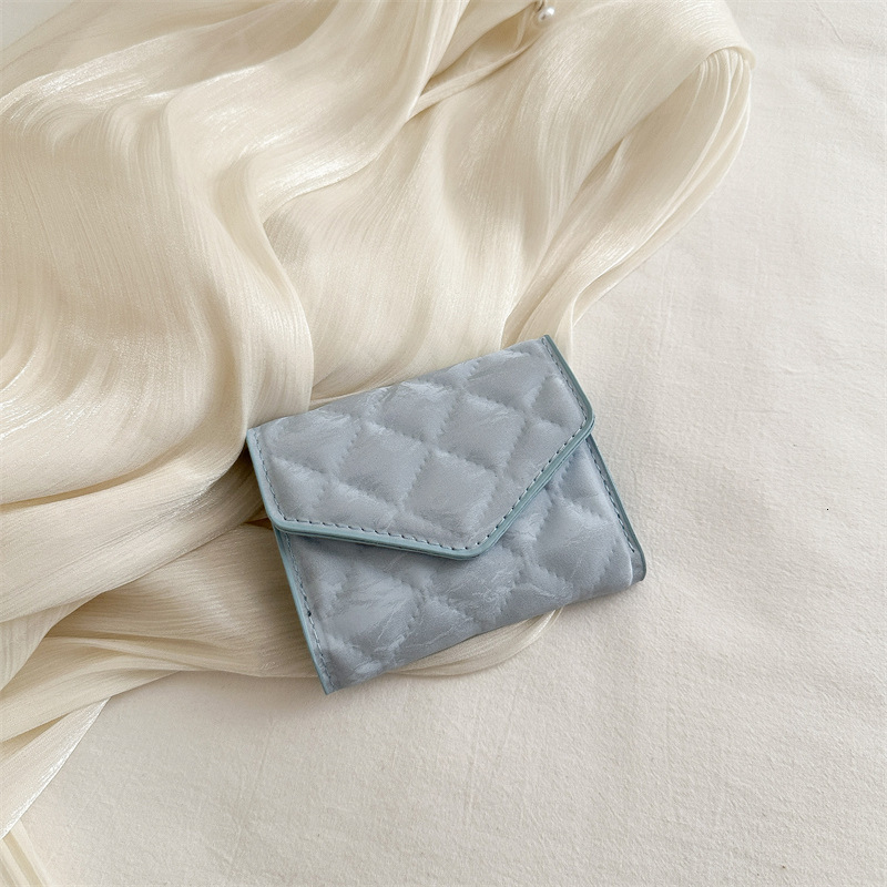 2025S Trend Designer Small Wallet With Niche Design Women S Simple And Fashionable Multi Buckle Diamond Grid Zero Wallet High End Short Clip Card Bag