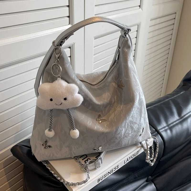 Large capacity bag suitable for women 2024 new summer high sensation niche commuting handbag single shoulder cross body bag Y250320