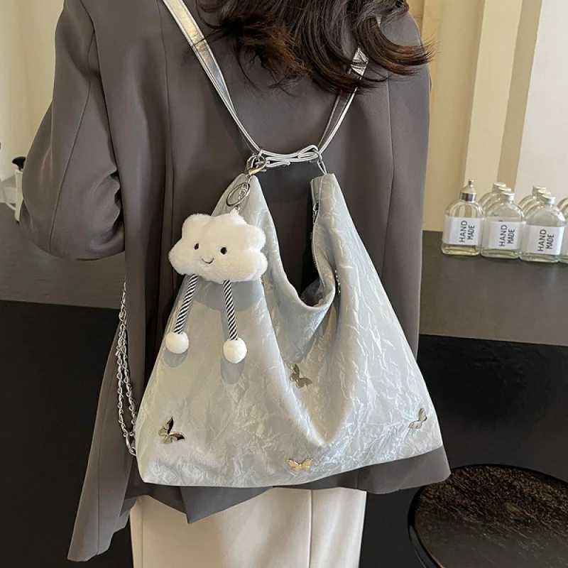 Large capacity bag suitable for women 2024 new summer high sensation niche commuting handbag single shoulder cross body bag Y250320