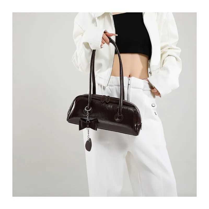 Womens Minimalist Solid Color Shoulder Bag Elegant Commute Burgundy Underarm Bag with Bow Pendant Vintage PU Leather Ladies Bag Y250319