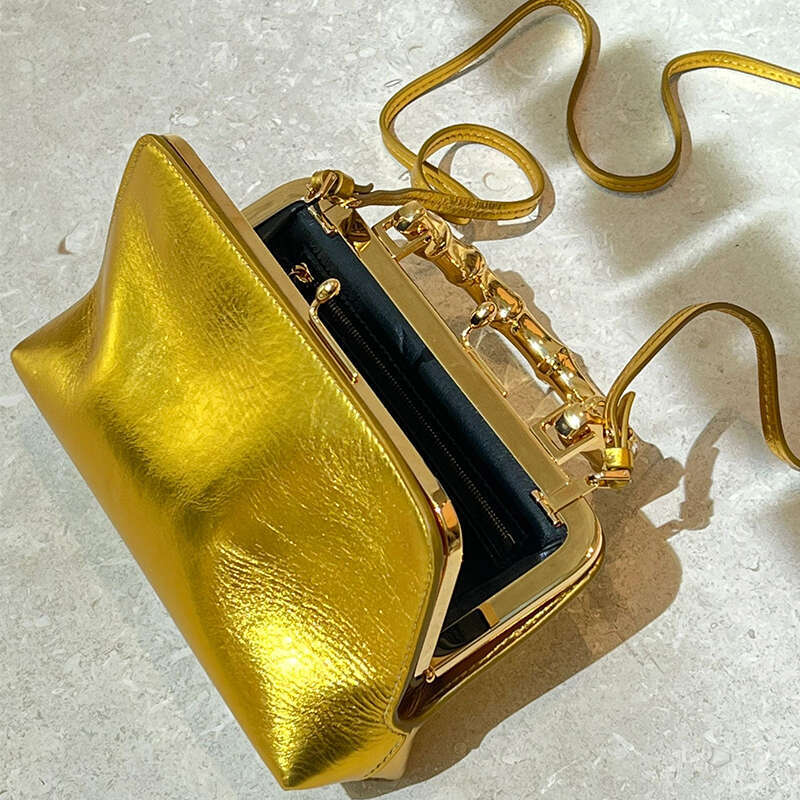 Women's Bags Small niche design with golden bamboo handle lock buckle, hand-held small square bag, new fashionable high-end mouth gold bag for wo