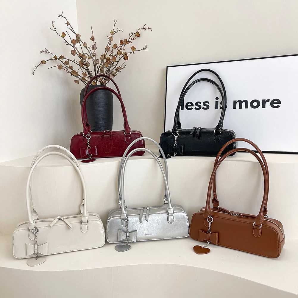 Womens PU underwear bag fashionable shoulder bag solid color elegant homeless bag zipper with heart-shaped pendant fashionable shoulder bag Y250319