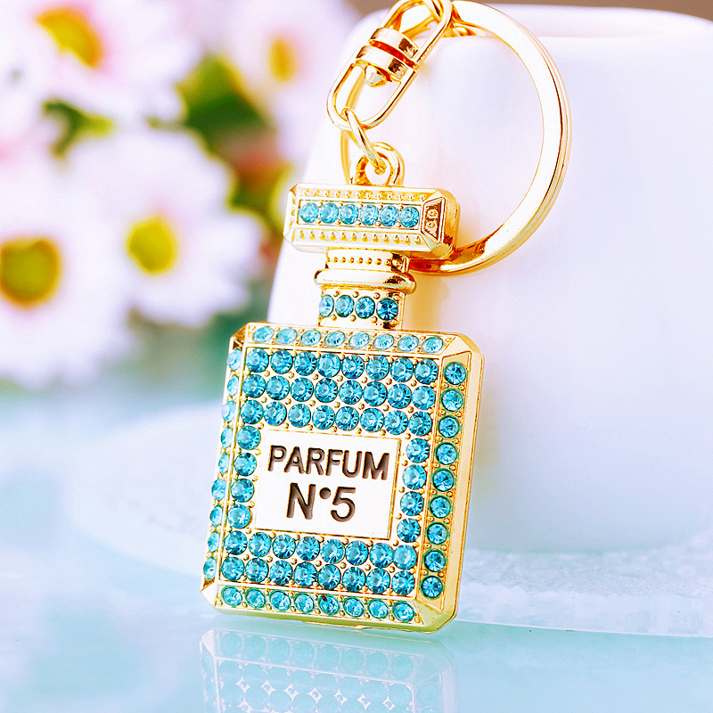 Chic Women's Keychain Featuring Diamond-Covered Perfume Bottle Design Stylish Metal Bag Accent