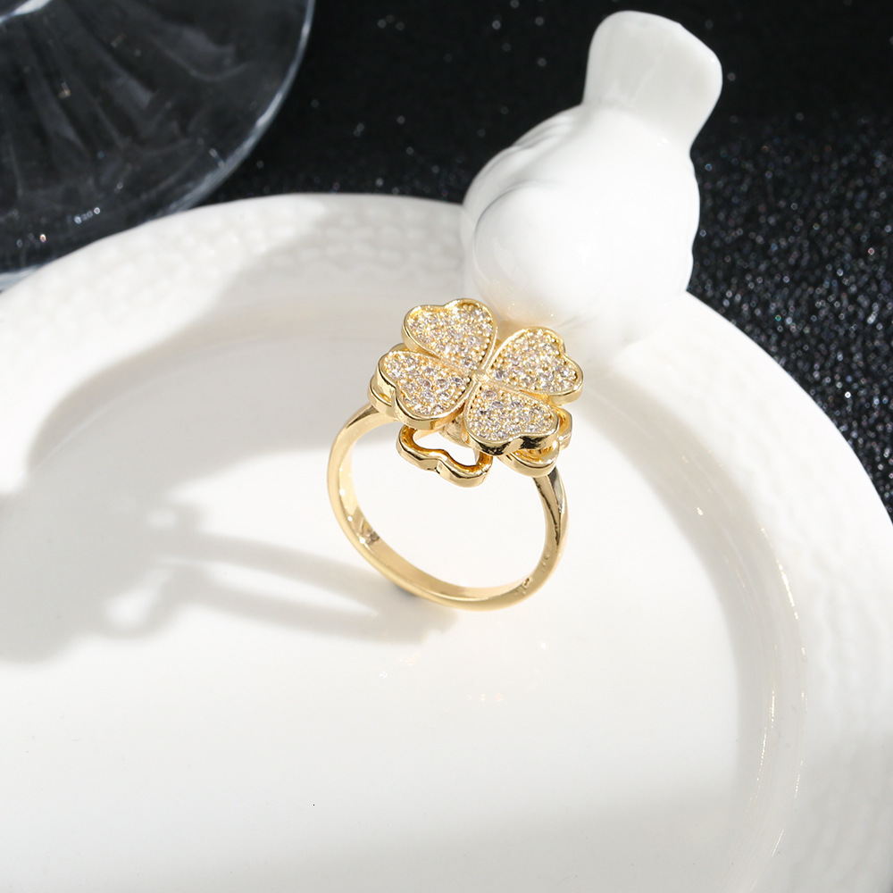Silver-Plated Cubic Zirconia Clover Ring with Rotating Feature - Elegant Stackable Accessory