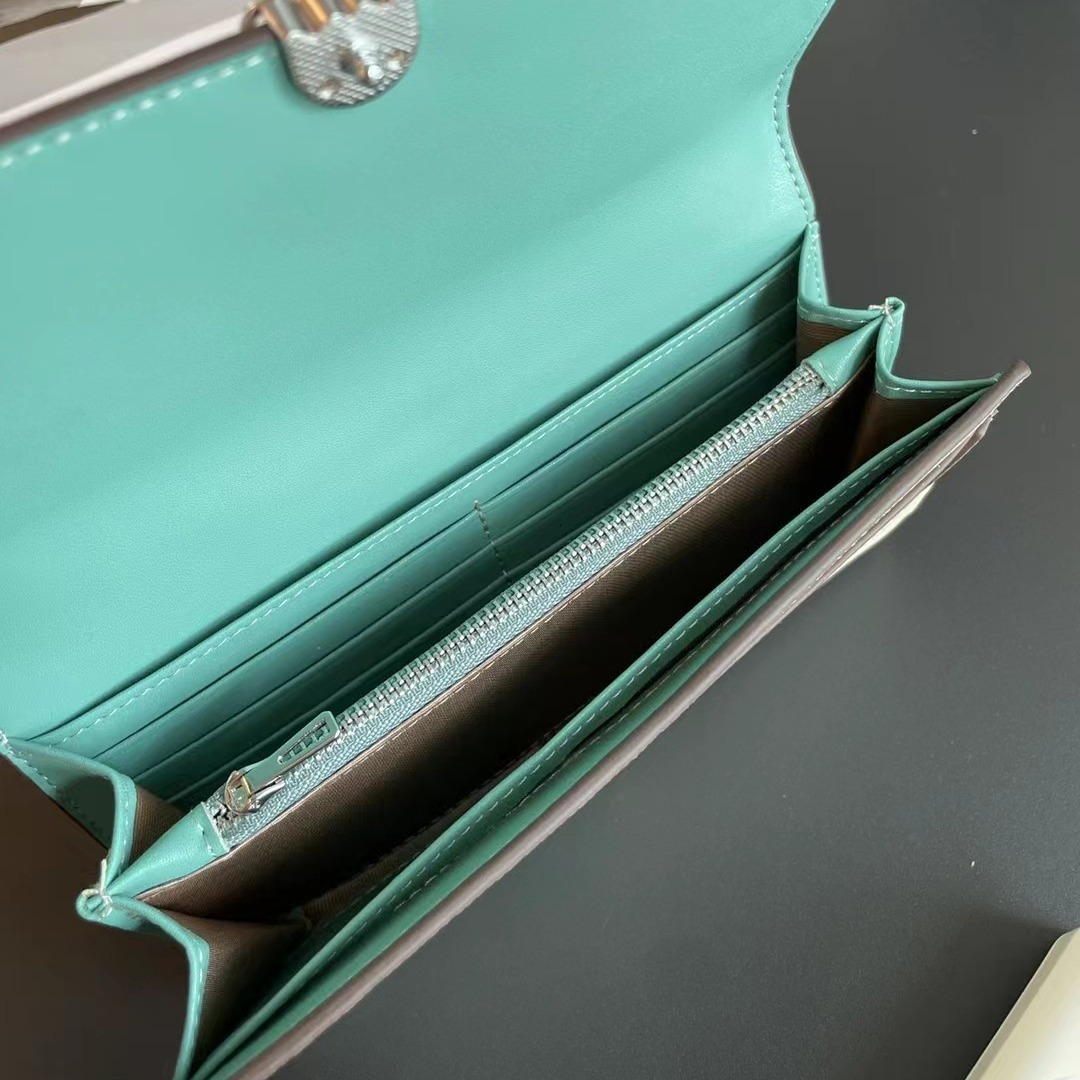 2025 New Genuine Leather Long Wallet with Two Fold Handheld Fashionable Hollow Flower Pattern Block shaped Wallet Designer Women's Color blocked 