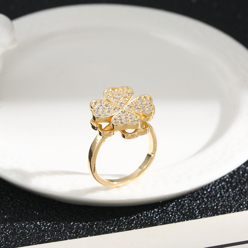 Silver-Plated Cubic Zirconia Clover Ring with Rotating Feature - Elegant Stackable Accessory