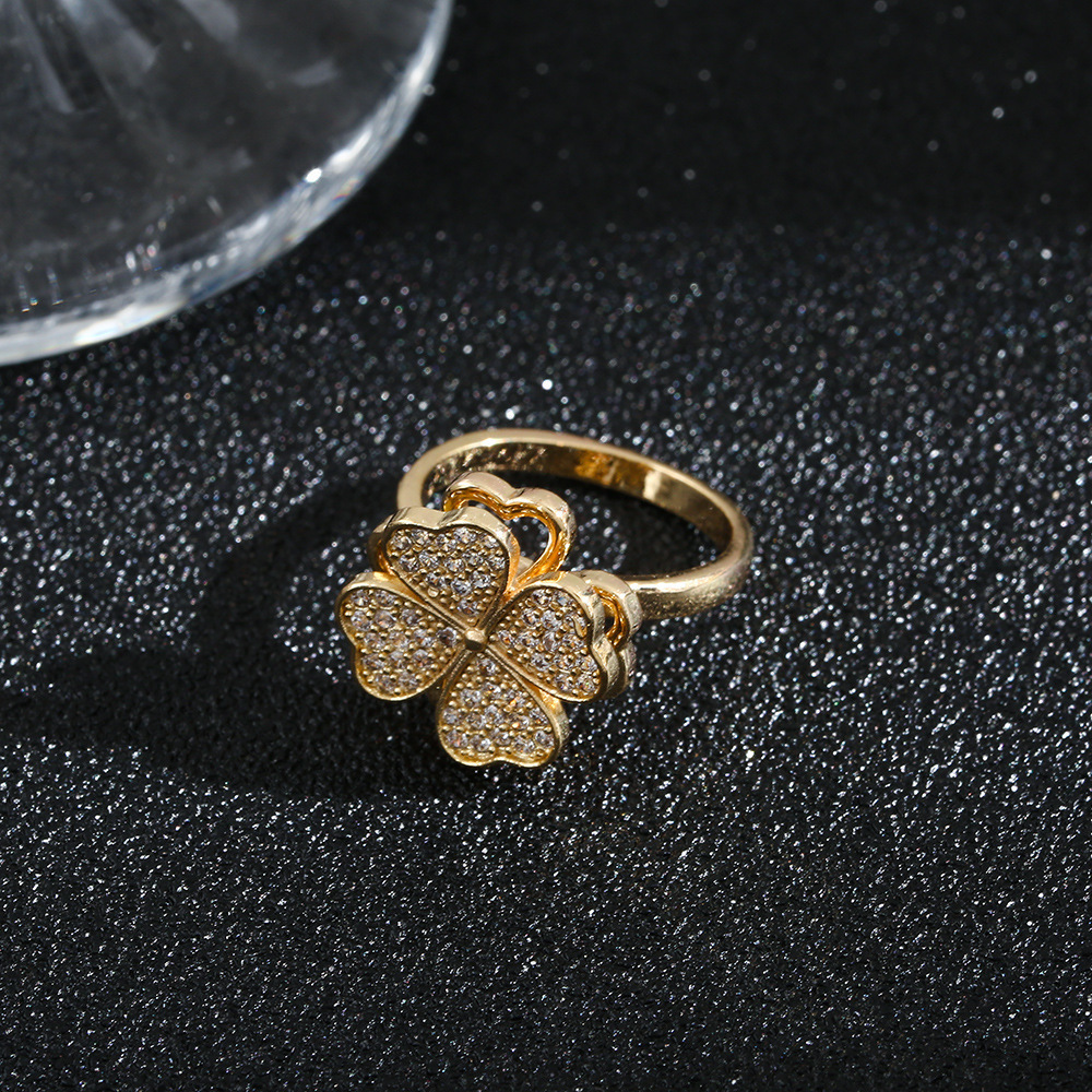 Silver-Plated Cubic Zirconia Clover Ring with Rotating Feature - Elegant Stackable Accessory