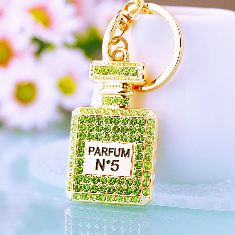 Chic Women's Keychain Featuring Diamond-Covered Perfume Bottle Design Stylish Metal Bag Accent