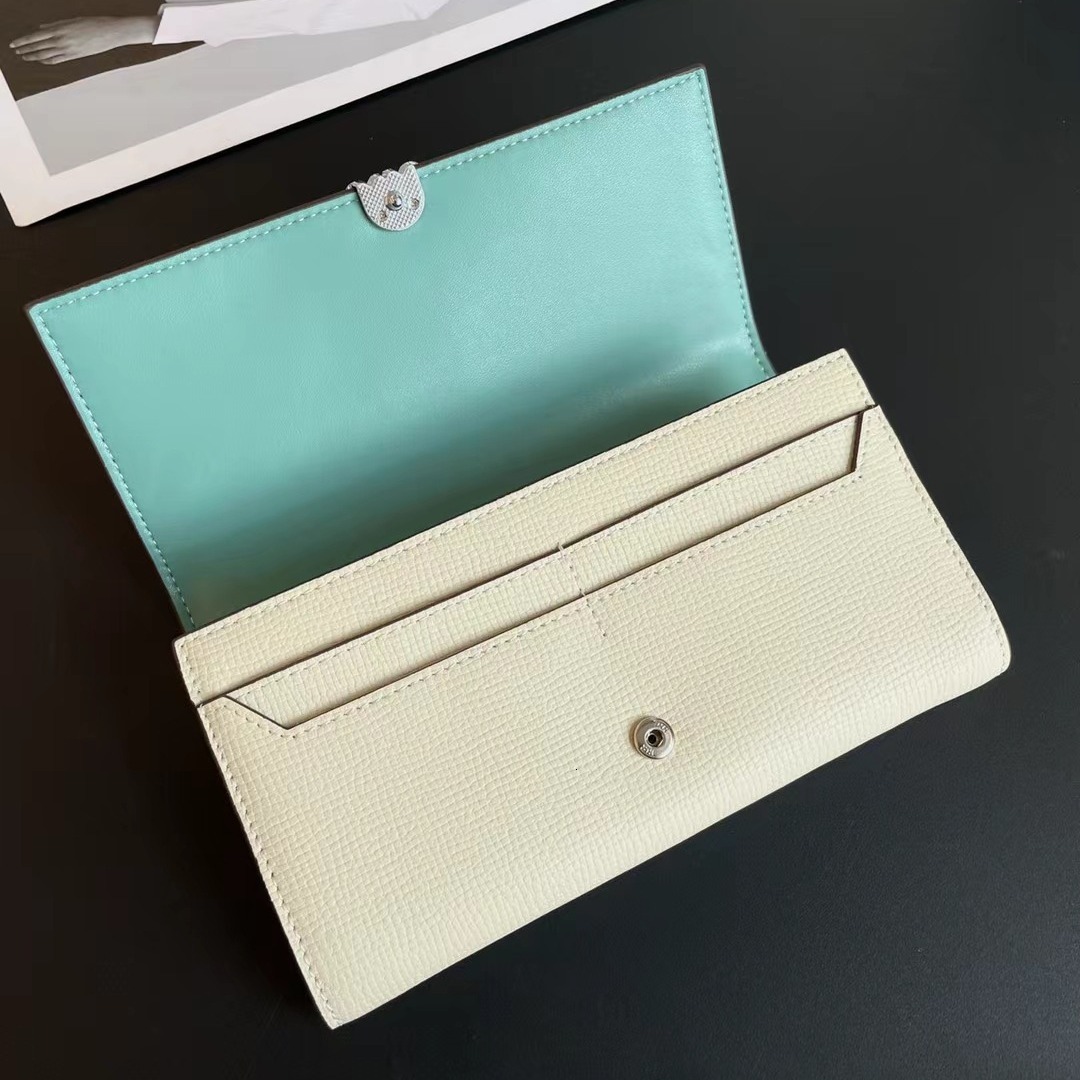 2025 New Genuine Leather Long Wallet with Two Fold Handheld Fashionable Hollow Flower Pattern Block shaped Wallet Designer Women's Color blocked 