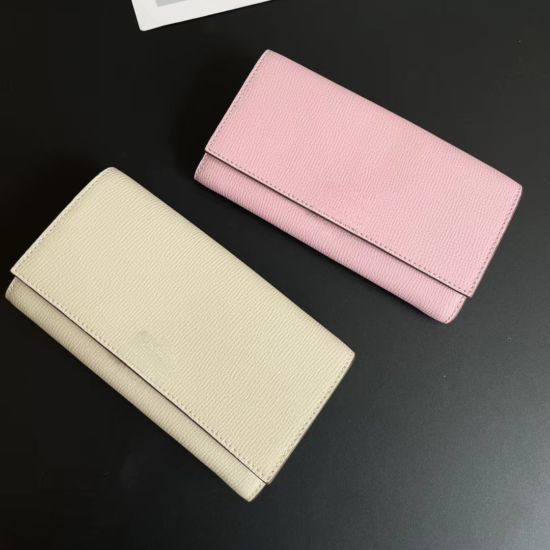 2025 New Genuine Leather Long Wallet with Two Fold Handheld Fashionable Hollow Flower Pattern Block shaped Wallet Designer Women's Color blocked 
