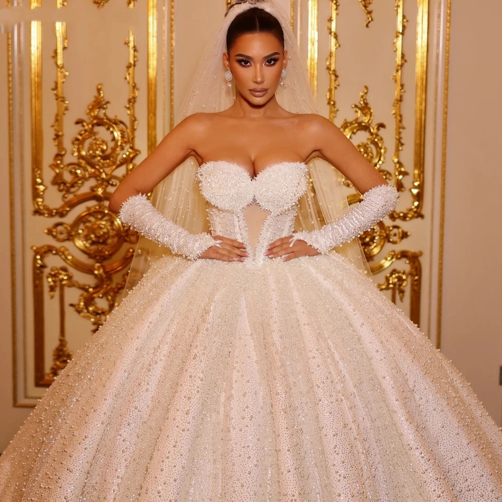 Illusion Ball Gown Wedding Dress Sweetheart Neck Sleeveless Bridal Gowns Sequins Pearls Sweep Train Dresses Custom Made vestidos de novia