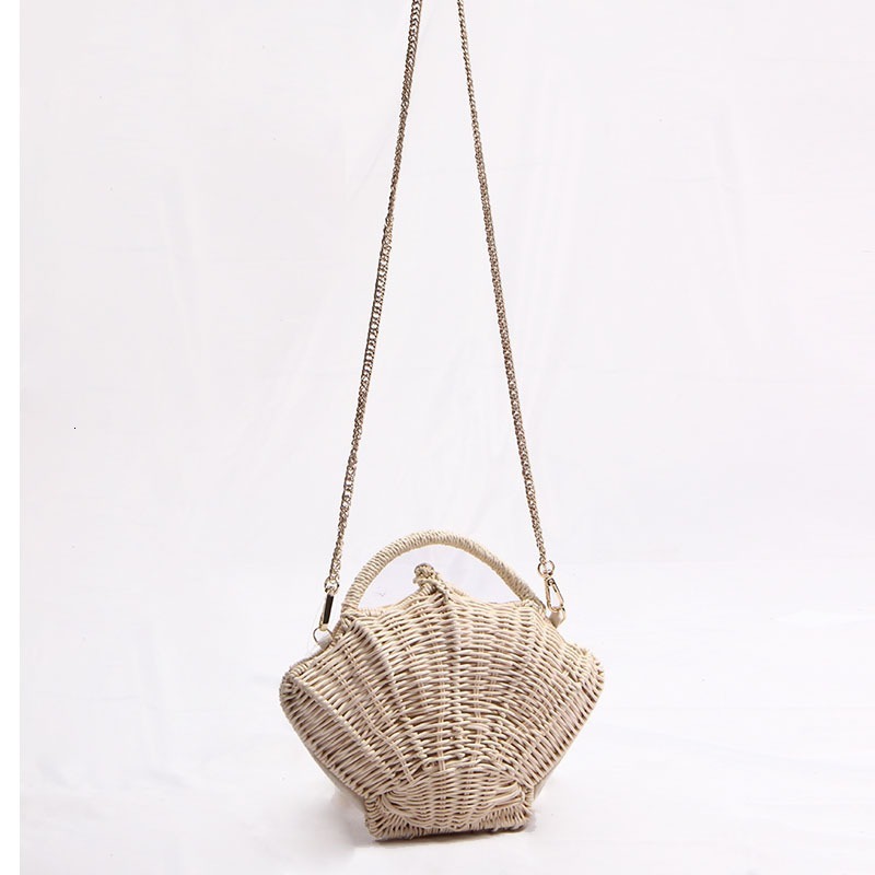 2025S Fashion Designer New Shell Shaped Chain Small Rattan Women S Ins Single Shoulder Hand Held Beach Vacation Bag Grass Woven Bag