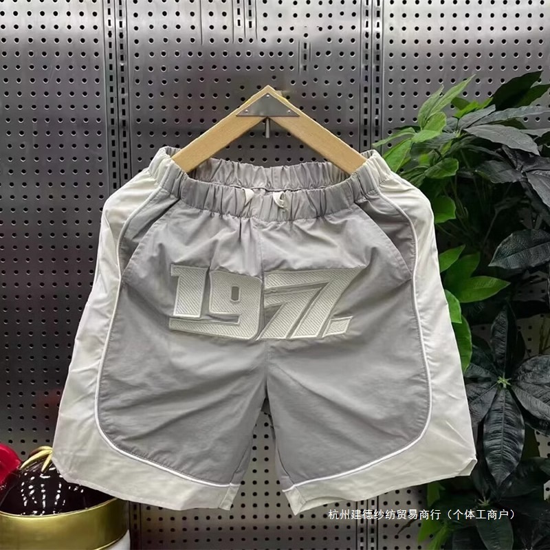 2025S Fashion Designer Summer New Trendy Brand Fashionable Casual Shorts Men S Patchwork Five Quarter Embroidered Loose Outdoor Sports Beach Pants